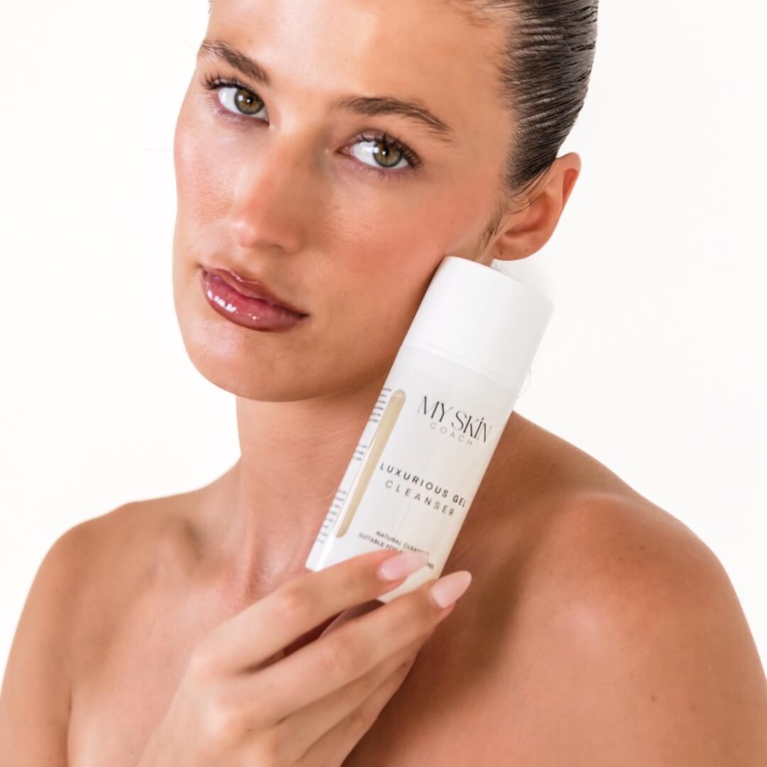 woman holding gel cleanser