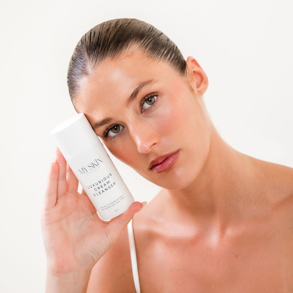 Woman holding Luxurious Cream Cleanser