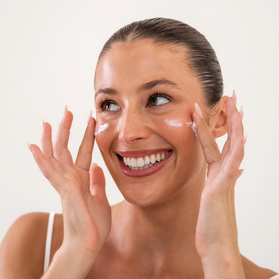 woman applying eye cream