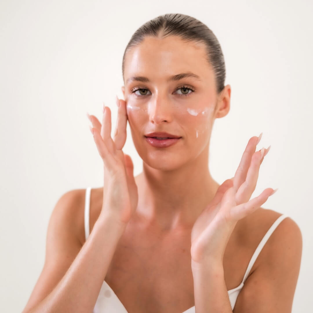 woman applying cream