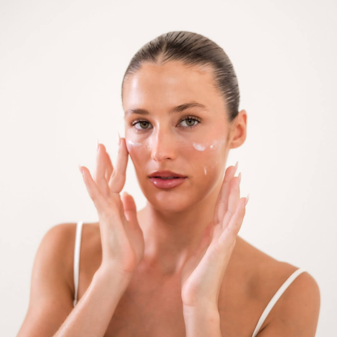 woman applying serum