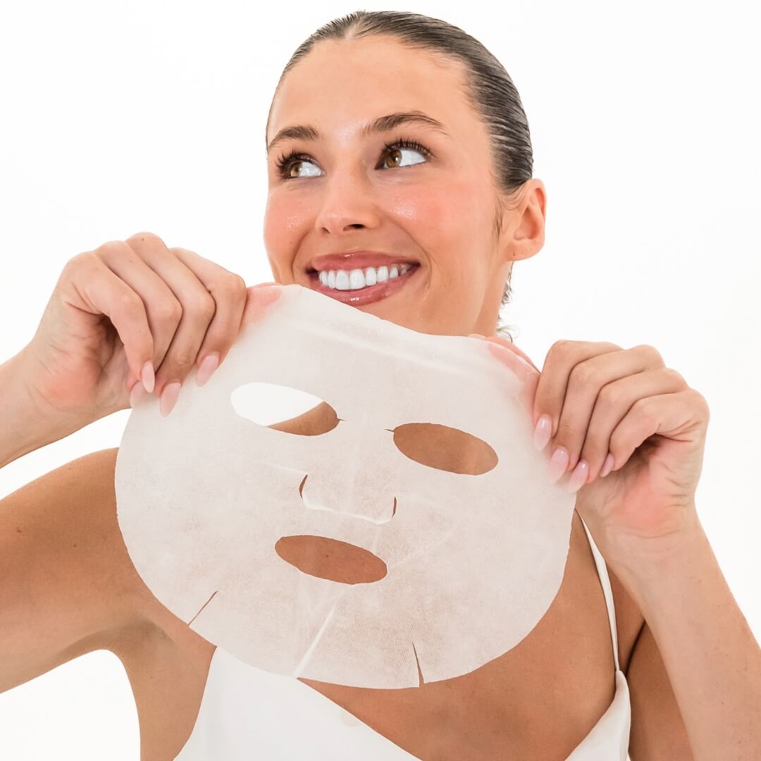 woman holding anti aging mask